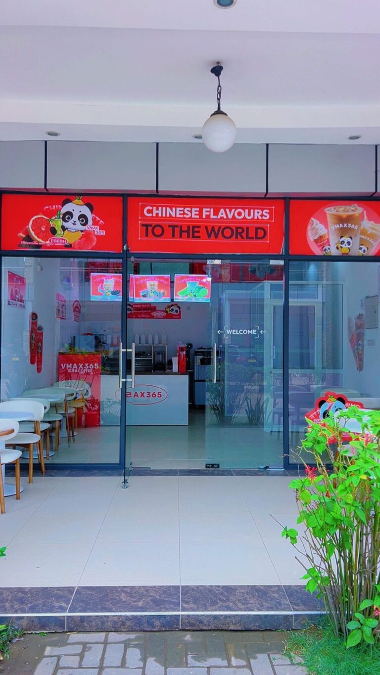 VMAX365 Tea & Coffee glass shopfront with Chinese Flavours signage at Shamo Tower, Mbezi Beach